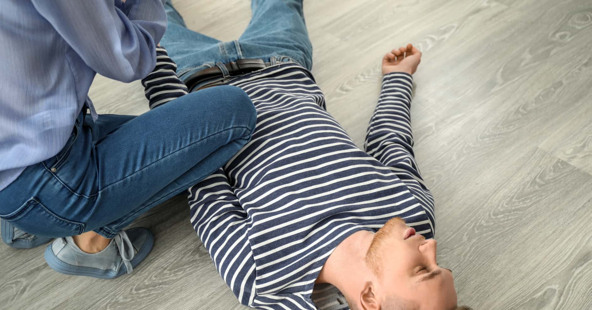 First aid assessment of an unconscious person in a UK setting