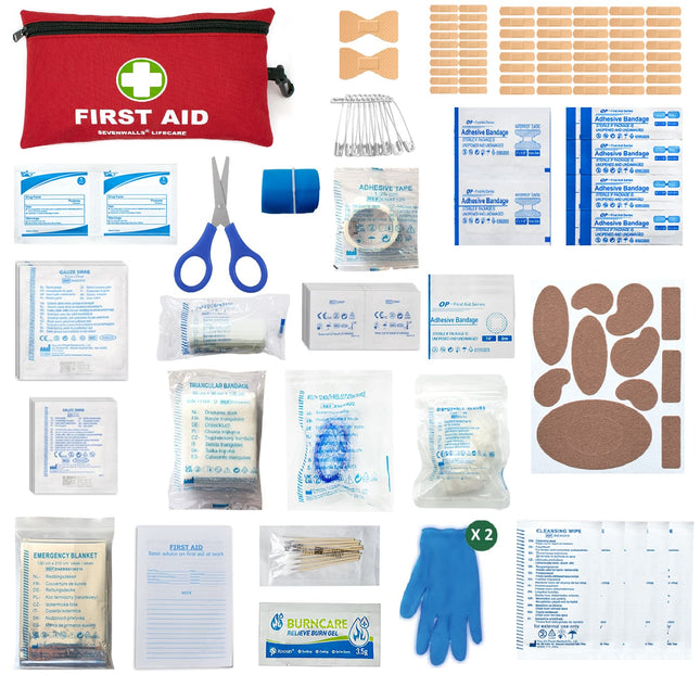 Collection of first aid supplies including bandages, scissors, and gloves on a white background.