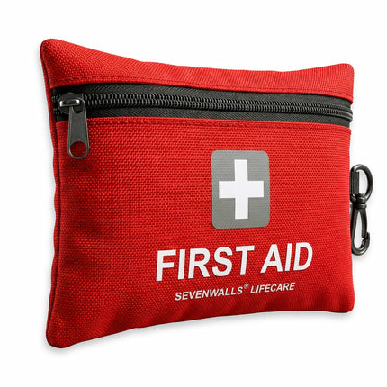 Red first aid kit with a black zipper on a white background