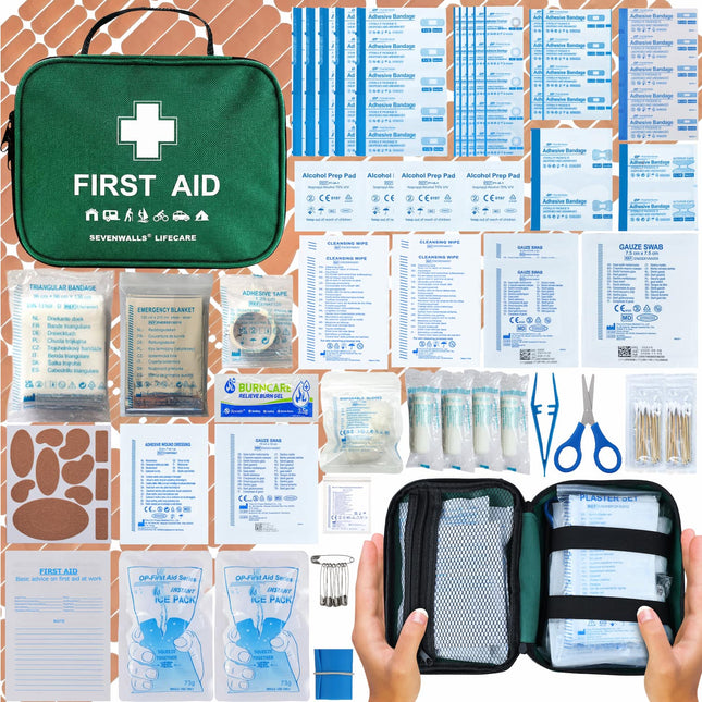 Collection of first aid items including a green kit, bandages, scissors, and other medical supplies on a checkered background.