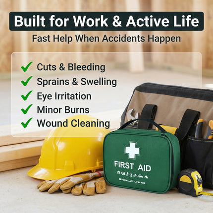 First aid kit with tools and safety gear on a wooden surface, emphasizing work and active life preparedness.